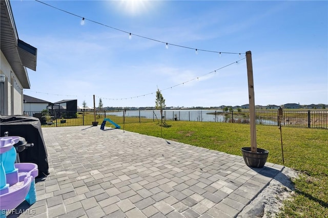 view of patio featuring a water view