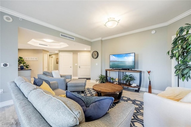 living room featuring light hardwood / wood-style floors and ornamental molding