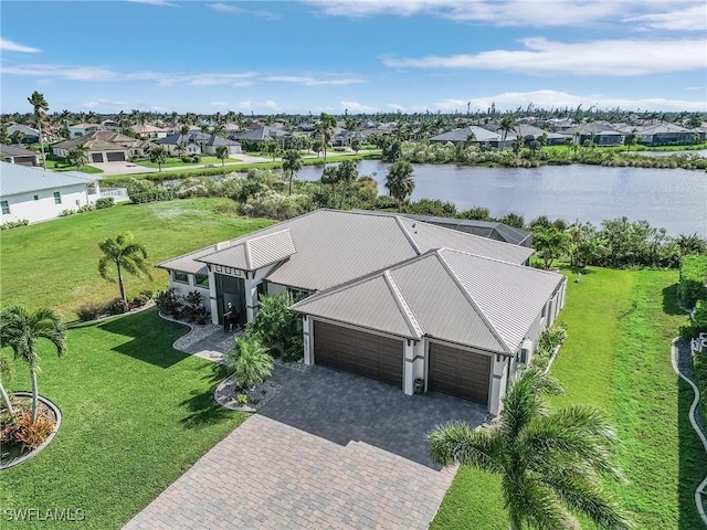 drone / aerial view with a water view