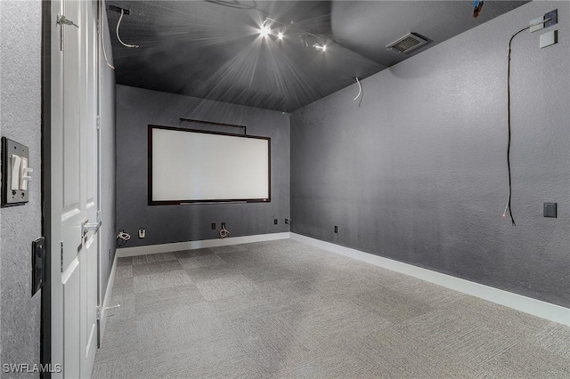 home theater room with carpet floors