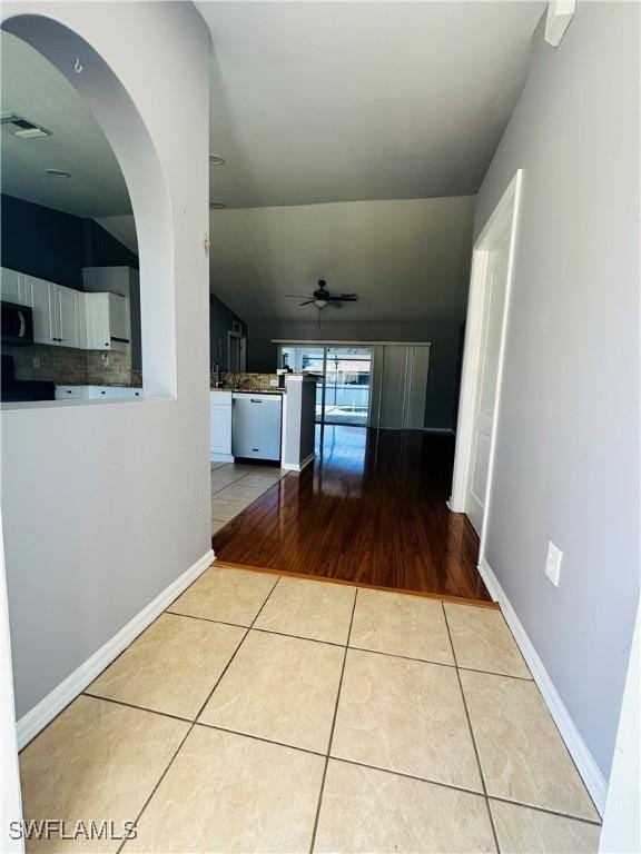 hallway with light tile patterned flooring