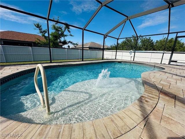 view of pool featuring a lanai and a patio area