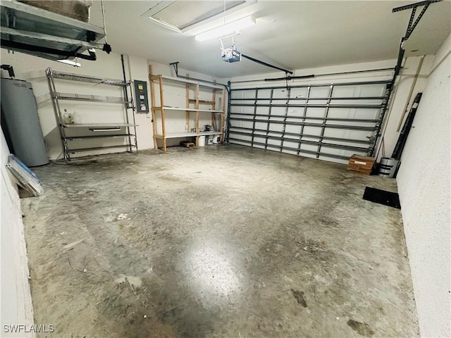 garage featuring electric panel, gas water heater, and a garage door opener