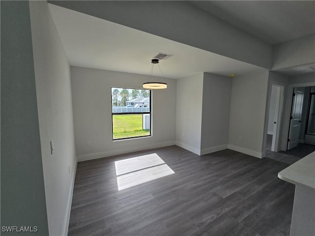 interior space with dark hardwood / wood-style flooring