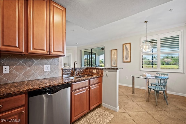 kitchen featuring dark stone counters, backsplash, stainless steel dishwasher, a sink, and light tile patterned flooring