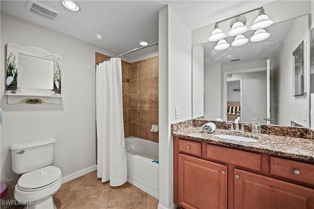 full bath with visible vents, toilet, shower / tub combo, vanity, and tile patterned floors