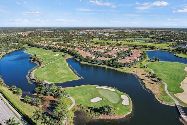 bird's eye view featuring view of golf course and a water view