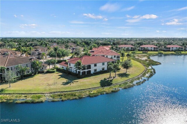 drone / aerial view with a water view