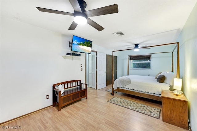 bedroom featuring ceiling fan and light hardwood / wood-style floors