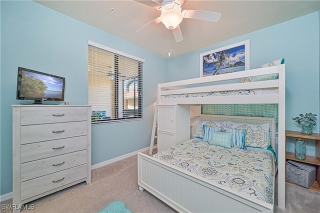 bedroom featuring ceiling fan and light colored carpet