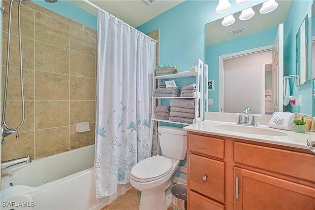 full bathroom featuring toilet, vanity, and shower / tub combo with curtain