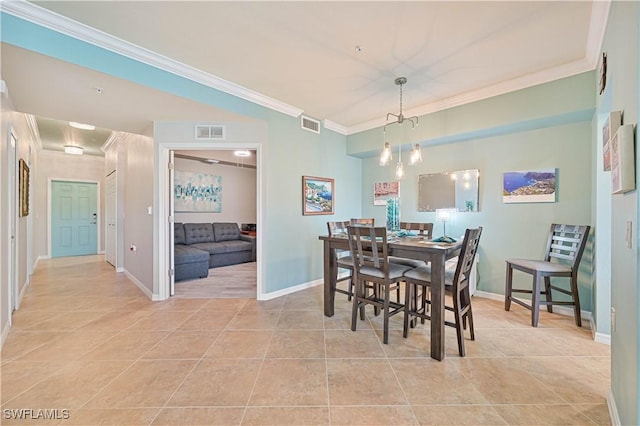 dining space featuring light tile patterned floors and ornamental molding