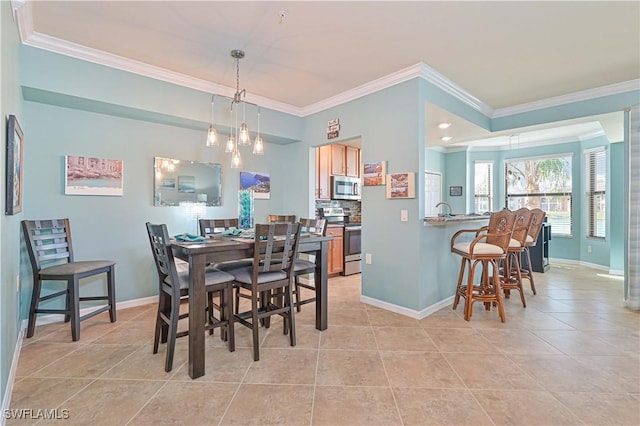 dining room featuring light tile patterned floors and crown molding