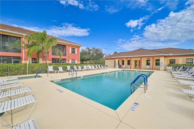 view of swimming pool featuring a patio