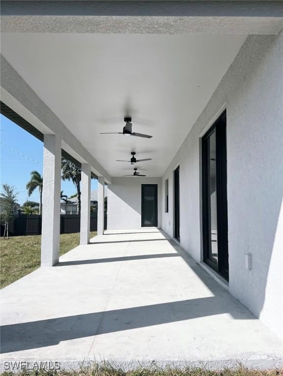 view of patio / terrace featuring ceiling fan