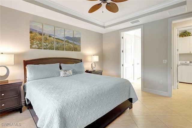 bedroom with washer / clothes dryer, ceiling fan, crown molding, and light tile patterned floors