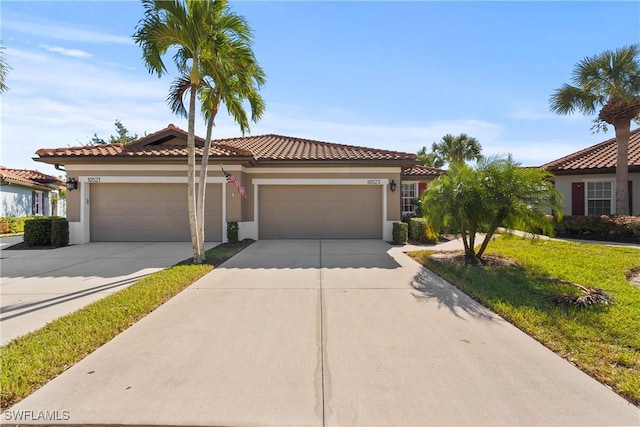 mediterranean / spanish-style house featuring a garage