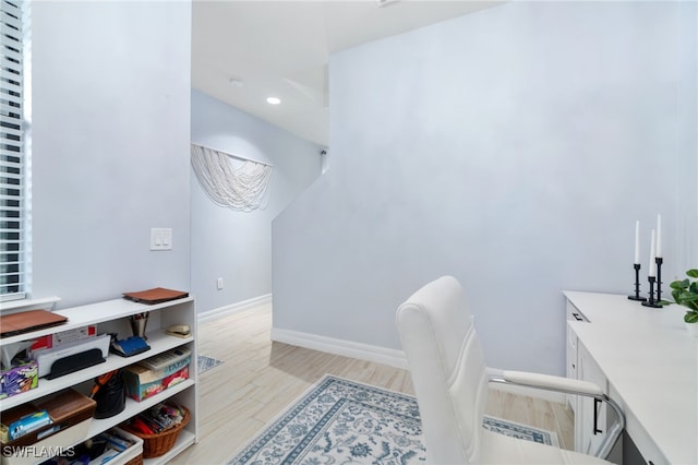 home office with light wood-type flooring