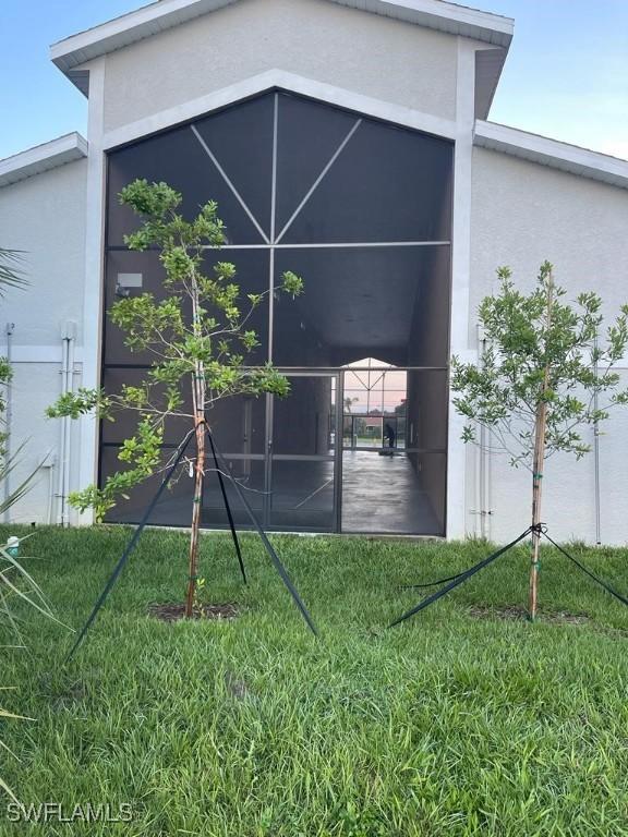 view of home's exterior featuring a lawn