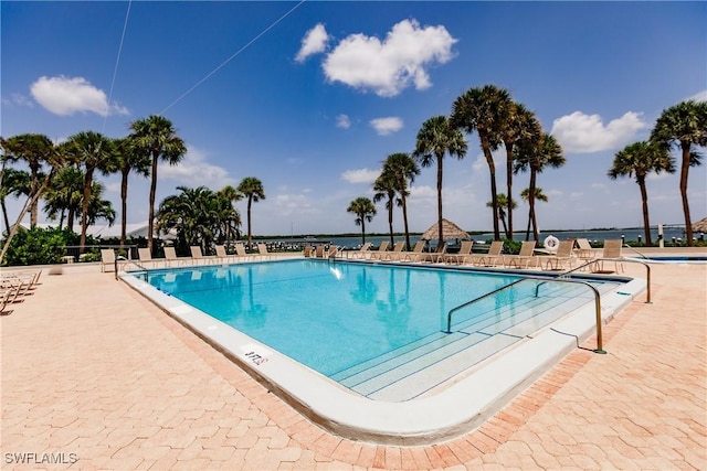 view of swimming pool featuring a patio area