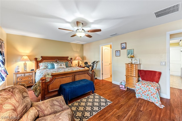 bedroom with hardwood / wood-style floors and ceiling fan