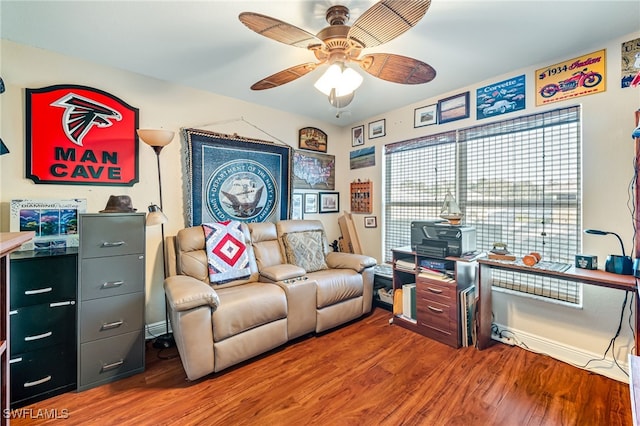 home office with hardwood / wood-style floors