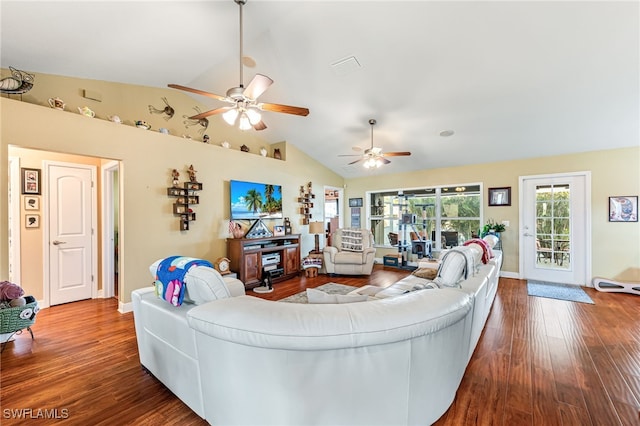 living room with hardwood / wood-style floors, ceiling fan, and lofted ceiling