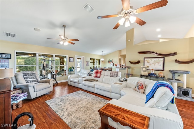 living room with ceiling fan, dark hardwood / wood-style flooring, and lofted ceiling