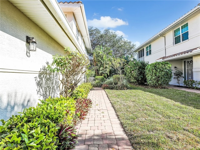 25051 Ballycastle Ct Unit 102, Bonita Springs, FL 34134 - view of grassy yard