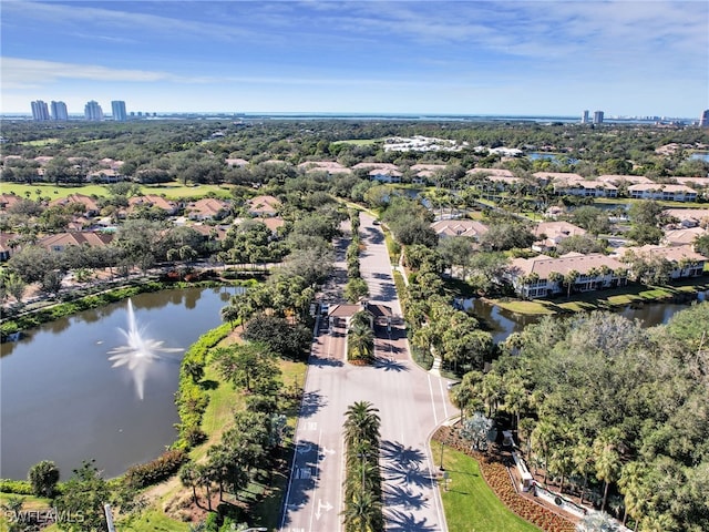 25051 Ballycastle Ct Unit 102, Bonita Springs, FL 34134 - aerial view of property and surrounding area featuring a large body of water and nearby suburban area
