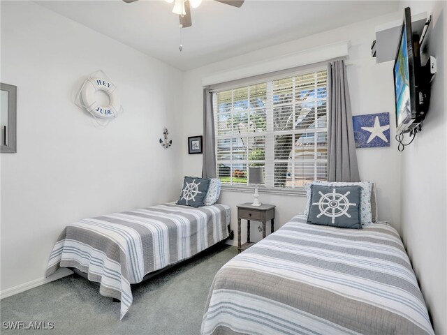 25051 Ballycastle Ct Unit 102, Bonita Springs, FL 34134 - bedroom featuring carpet floors and a ceiling fan
