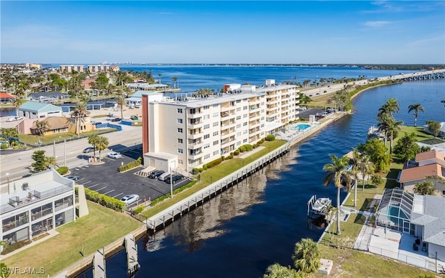 drone / aerial view with a water view