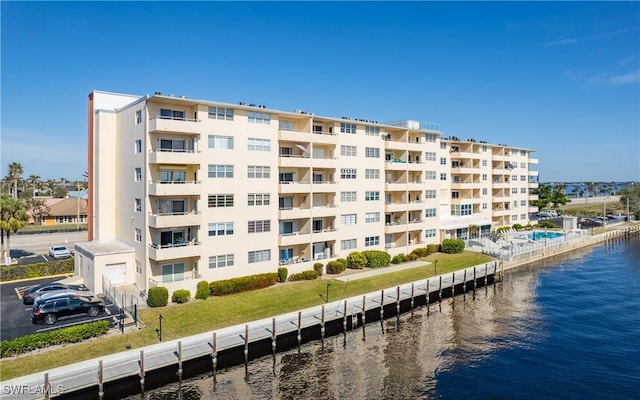 view of building exterior featuring a water view