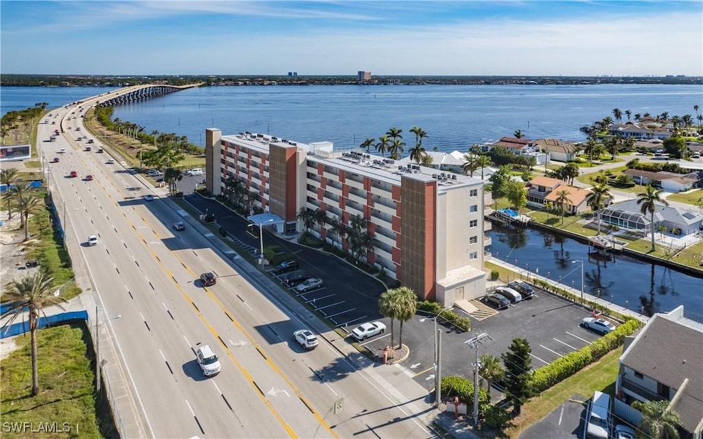 birds eye view of property featuring a water view