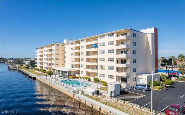 view of building exterior featuring a water view