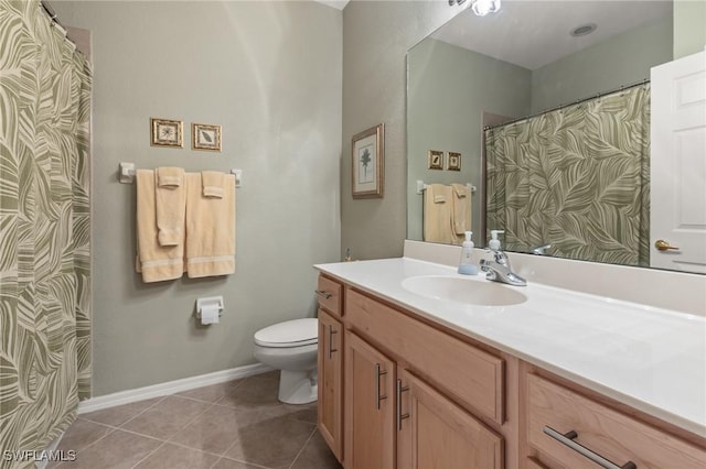 14712 Calusa Palms Dr Unit 103, Fort Myers, FL 33919 - full bath with toilet, tile patterned floors, vanity, and baseboards