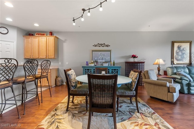 14712 Calusa Palms Dr Unit 103, Fort Myers, FL 33919 - dining space featuring wood finished floors and recessed lighting