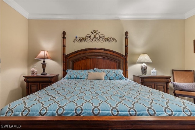 bedroom with crown molding