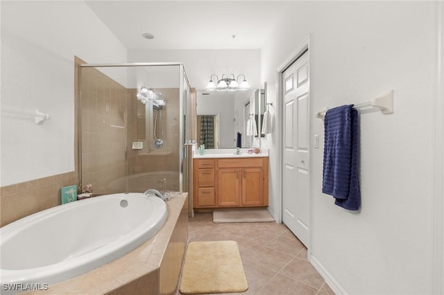 14712 Calusa Palms Dr Unit 103, Fort Myers, FL 33919 - full bath featuring a shower stall, a bath, vanity, and tile patterned floors