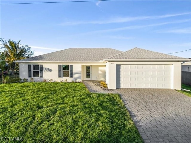 ranch-style house with a garage and a front yard