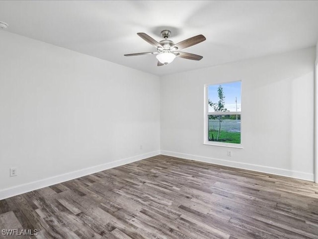 unfurnished room featuring hardwood / wood-style floors and ceiling fan