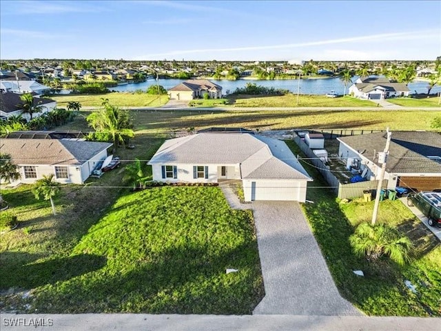 drone / aerial view featuring a water view