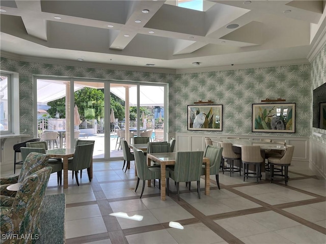 dining area with wallpapered walls, recessed lighting, a wainscoted wall, and french doors