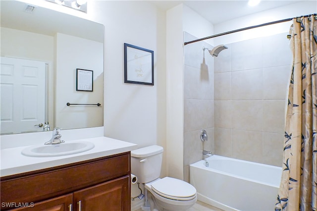 full bathroom featuring vanity, toilet, and shower / tub combo