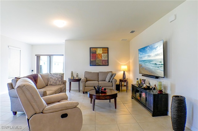 living room featuring light tile patterned flooring