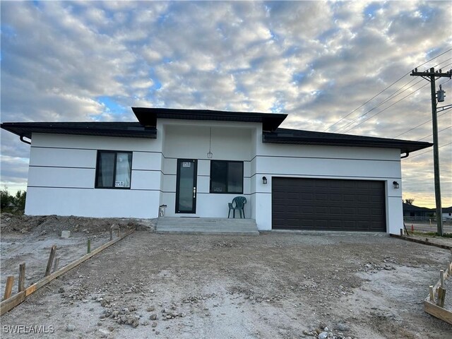 view of front of home featuring a garage