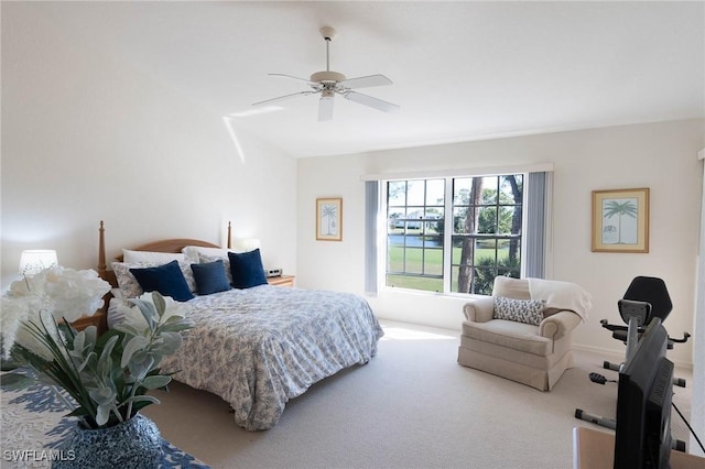 bedroom featuring ceiling fan and carpet flooring