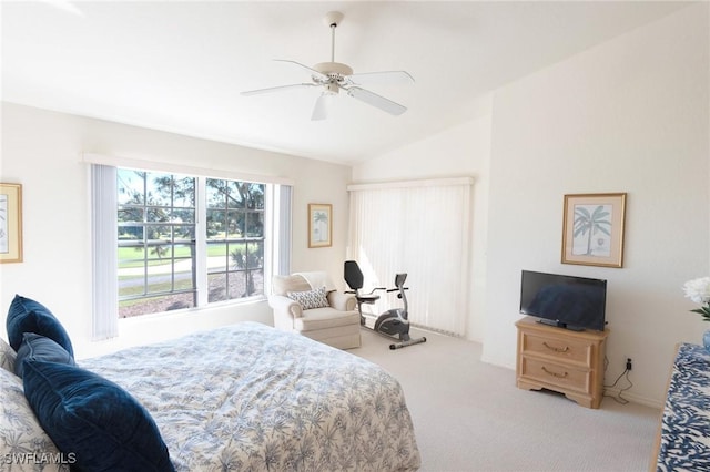 carpeted bedroom featuring lofted ceiling and ceiling fan