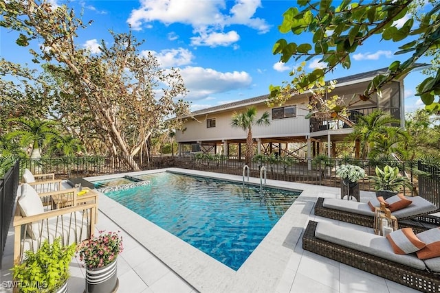 view of pool featuring a patio area