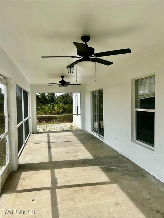 view of patio with ceiling fan